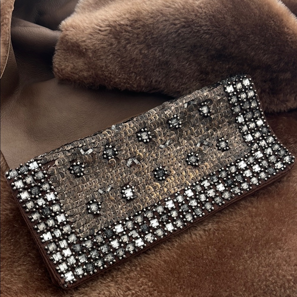 Tory Burch vintage Brown Beaded suede Clutch. Measures 9.5” x 4.5”